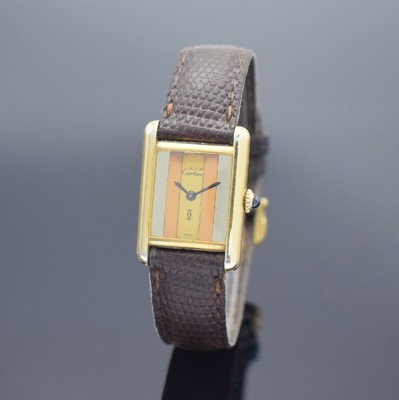 CARTIER Damenarmbanduhr Modellserie Tank, Handaufzug, Schweiz um 1980, verg. Sterlingsilbergeh. inkl. orig. Lederband m. verg. Dornschl., Boden ...