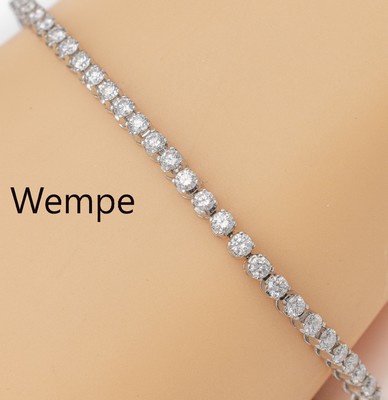 18 kt Gold WEMPE Brillant-Rivierearmband, WG 750/000, 57 Brillanten zus. ca. 4.00 ct feines Weiß/si, L. ca. 18.5 cm, Kastenschloß mit 2 ...
