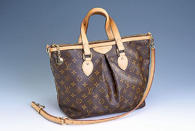 LOUIS VUITTON Handtasche, Modell Tivoli, Monogram Canvas, Besätze aus naturf. Rindsleder, goldf. Messingbeschläge, Innen brauner Stoff, ...