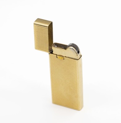 18 kt Gold Feuerzeug, GG 750/000, schlichteGestaltung, ca. 5.5 x 2.2 cm, Funktion ungepr.Gewicht Hülle ca. 15.3 g