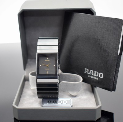 RADO Jubile Herrenarmbanduhr, Schweiz um 1997, quarz, Keramikgeh., Keramikgliederbd. m. dopp. Faltschl., schwarzes Zifferbl., gold. Zeiger, Datum, M. ...