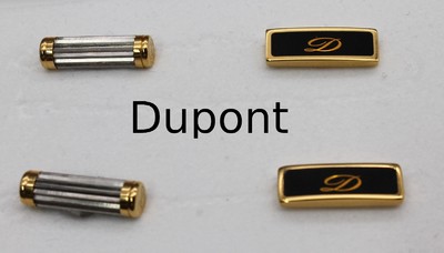 2 Paar DUPONT Manschettenknöpfe, 1 x schlicht, Metall verg., Platte mit schwarzem Lack, 1 x schlicht, teilverg., je in orig. Etui, sign.