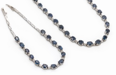14 kt Gold Diamant-Saphir-Schmuckset, WG 585/000, best. aus: 1 Armband, 13 ovalfacett. Saphire zus. ca. 4.50 ct, 12 8/8-Diamanten zus. ca. 0.06 ct ...
