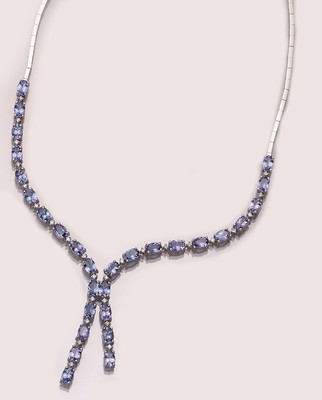 14 kt Gold Tansanit-Brillant-Y-Collier, WG 585/000, 29 ovalfacett. Tansanite zus. ca. 12 ct, 27 Brillanten zus. ca. 0.50 ct Weiß/si, L.ca. 43 cm, ...