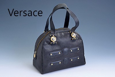 GIANNI VERSACE Henkeltasche, Vintage, schwarzes genarbtes Leder, mit goldfarbenen Medusa-Köpfen verz., schwarzes Innenfutter mitLogo, 1 seitl. Fach ...
