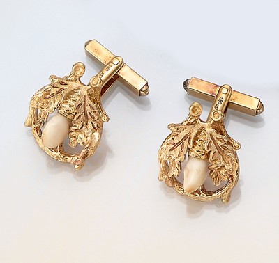 Paar 14 kt Gold Grandel-Manschettenknöpfe, deutsch um 1970/80, GG 585/000, Eichenlaubmit Geweihdekor, 2 Grandeln, total ca. 7.7 g