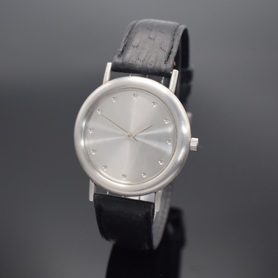 LUDGER KÄMPER Platin Armbanduhr, Schweiz um 1990, Handaufzug, beids. verg. Geh., Boden 6- fach verschr., orig. Lederband mit Platin- Dornschließe, ...