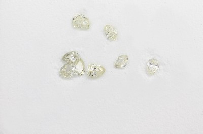 Lot 8 Diamant-Tropfen zus. ca. 1.35 ct get. (yellow)/si-p 1