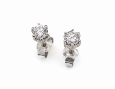 Paar 14 kt Gold Brillant-Ohrstecker, WG 585/000, 2 Brillanten zus. ca. 0.60 ct Weiß/p