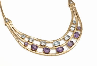 18 kt Gold Farbstein-Brillant-Collier, GG 750/000, Mittelteil 3-rhg., 7 rund- und ovalfacett. Amethyste zus. ca. 22 ct, 7 rund- und ovalfacett. ...