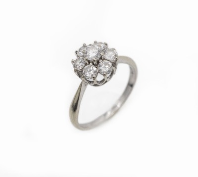 18 kt Gold Brillant-Ring, WG 750/000, mit 7 Brillanten zus. ca. 0.80 ct Weiß/si, RW 52