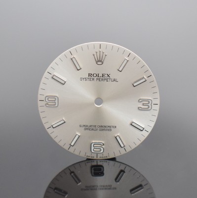 ROLEX original Zifferblatt für z.B. Ref. 116000, Schweiz um 2010, versilb. 3-6-9- Blatt, aufges. silb. Leuchtindices & -Zahlen, Rücks. sign. & ...