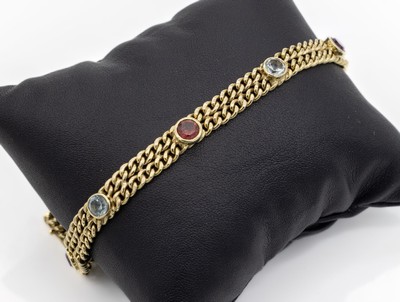 14 kt Gold Farbstein-Armband, GG 585/000, 2rhg. Flachpanzerarmband, bes. mit 6 rundfacett. Farbsteine, u.a. Aquamarine, Granat zus. ca 7.0 ct, L. ...
