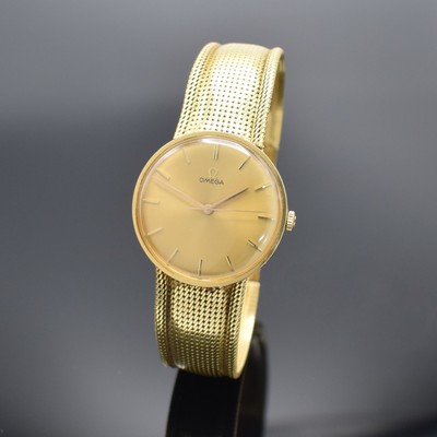 OMEGA Herrenarmbanduhr in GG 750/000 Referenz 14756SC-61, Schweiz um 1961, Handaufzug, 3-teil. Geh., Boden & Glasrand aufgedr., neutrales ...