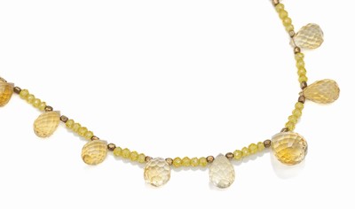 Citrin-Collier, Karabinerschließe 925er Silber, 17 facett. Citrinpampeln und facett. Lemon-Quarz-Rondelle (beh.) zus. ca. 90.00 ct, L. ca. 46 cm