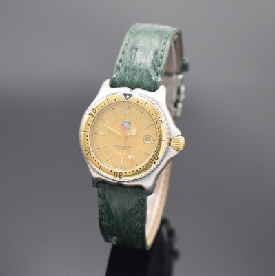 TAG HEUER Damen-Sportuhr in Stahl/Gold Referenz WI 1351, Schweiz um 2000, quartz, verschr. Geh., eins. drehbare Lünette m. 60er-Tlg., gold. ...