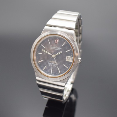 OMEGA Electronic f300Hz Herrenarmbanduhr, Schweiz um 1972, Stahlgeh., Boden geschr., orig. Gliederband, Faltschl. mit Widmung, Zifferbl. m. aufges. ...