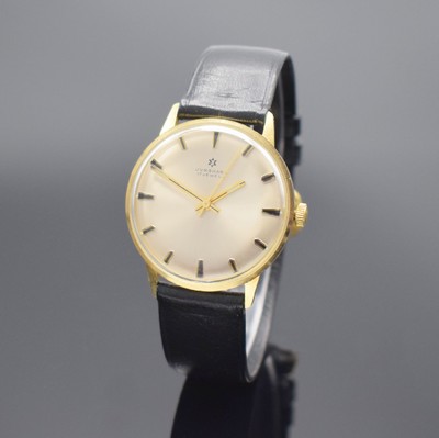 JUNGHANS Herrenarmbanduhr in GG 585/000, Deutschland 1970er Jahre, Handaufzug, Boden aufgedr., silb. Zifferbl. m. aufges. Std.- Ind., gold. Zeiger, ...