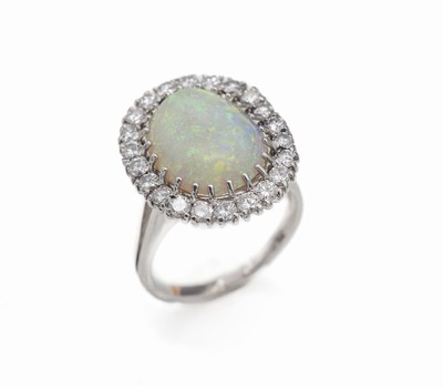 18 kt Gold Opal-Brillant-Ring, WG 750/000, Opal ca. 3.00 ct (Rand best.), 22 Brillanten zus. ca. 1.30 ct feines Weiß-Weiß/vs-si, ca. 7.1 g, RW 53.5