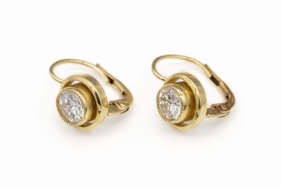 Paar 18 kt Gold Brillant-Ohrstecker, GG 750/000, 2 Brillanten zus. ca. 1.10 ct feines Weiß/vs, ca. 3.4 g, mit Etui