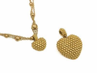 18 kt Gold Konvolut, GG 750/000, bestehend aus: 3-reihigem Collier mit Herzabhängung mit Goldgranulaten, L. ca. 44 cm, Kastenschloß, dazu passend ...