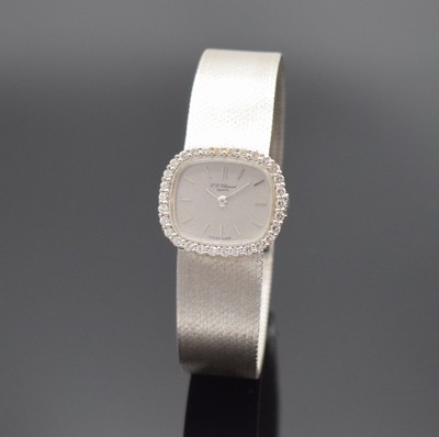 CHOPARD Damenarmbanduhr in WG 750/000, Handaufzug, Schweiz um 1970, 2-teil. Geh. an Milanaiseband, Boden aufgedr., Lünette aufw. m. Diamanten ...