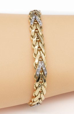14 kt Gold Brillant-Armband, GG/WG 585/000, 30 Brillanten zus. ca. 0.30 ct Weiß/si, total ca. 14.5 g, L ca. 19 cm, Kastenschloß mit 2 ...