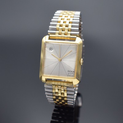 DOXA Grafic Herrenarmbanduhr in GG 750/000, Schweiz um 1960, Automatik, 2-teil. Gehäuse, Boden aufgedr., neutr. Stahlbd. teils verg., silb. ...