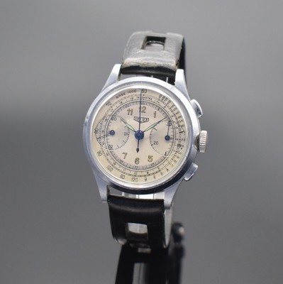 HEUER Herrenarmbanduhr mit Chronograph, Schweiz um 1940, Handaufzug, 3-teil. verchr. Geh., sign. Boden & Glasrand aufgedr., silb. sign. Zifferbl. m. ...