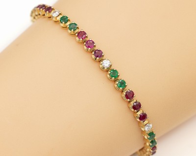 14 kt Gold Farbstein-Brillant-Armband, GG 585/000, 21 rundfacett. Rubine zus. ca. 3.24 ct, 14 rundfacett. Smaragde zus. ca. 1.94 ct, 7 Brillanten ...