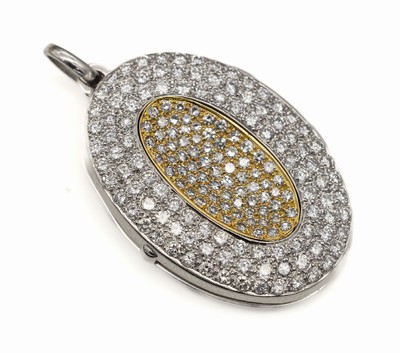 18 kt Gold Brillant-Medaillon, WG/GG 750/000, im Außenkranz 106 Brillanten, Innen in GG gefasst 75 8/8-Diamanten zus. ca. 5.00 ct Weiß/si, ...