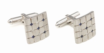 Paar 14 kt Gold Saphir-Brillant-Manschetten- knöpfe, WG 585/000, quadratisch, insg. 10 rundfacett. Saphire zus. ca. 0.16 ct, 8 Brillanten zus. ca. ...