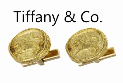 Paar 18 kt Gold Manschettenknöpfe TIFFANY & CO, GG 750/000, Oberteile in GG 22 kt, Sternzeichen Stier, ca. 17.6 g