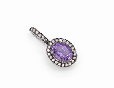 18 kt Gold Clip-Anhänger mit Amethyst und Brillanten, WG 750/000, ovalfacett. Amethyst ca. 1.70 ct, Brillanten zus. ca. 0.49ct Weiß/si, ca. 4.1 g, ...