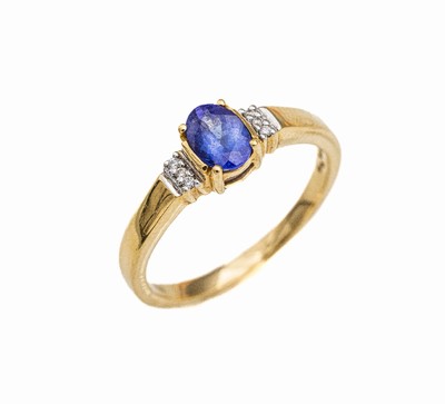 18 kt Gold Tansanit-Brillant-Ring, GG 750/000, mittig ovalfacett. Tansanit ca. 0.75 ct, 6 Brillanten zus. ca. 0.04 ct Weiß/si, RW 63, ca. 4.3 g, ...