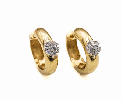 14 kt Gold Brillant-Creolen, GG/WG 585/000,jeweils 7 Brillanten zus. ca. 0.20 ct Weiß/si,D. ca. 1.5 cm, ca. 6 g
