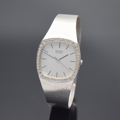 SEIKO Armbanduhr in WG 585/000, Japan 1970er Jahre, quarz, Boden aufgedr., Lünette aufw. mit Diamanten bes., silb. Zifferbl. m. aufgel. Indizes ...