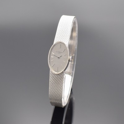 L. U. CHOPARD Damenarmbanduhr in WG 750/000 Referenz 5026, Schweiz um 1980, Handaufzug, 2-teil. Gehäuse, Boden aufgedr., Milanaiseband, silb. ...