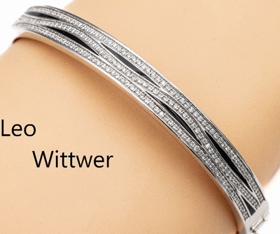18 kt Gold LEO WITTWER Brillant-Armreif mit Email, WG 750/000, 3-reihig bes. mit Brillanten zus. ca. 0.93 ct feines Weiß-Weiß/ vs-si, z.T. schwarz ...