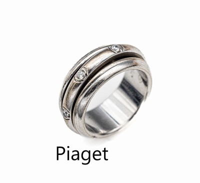 18 kt Gold PIAGET Brillant-Ring, WG 750/000, schlichtes Design Mittelschiene mit 7Brillanten zus. ca. 0.20 ct Weiß/si, drehbar, RW 53, ca. 13.5 g, ...
