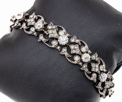 Platin und GG 750/000 Diamant-Armband, Frankreich um 1880/90, Altschliff-Diamanten und Diamantrosen zus. ca. 8.50 ct Weiß/si-p, L. ca. 18 cm, ...