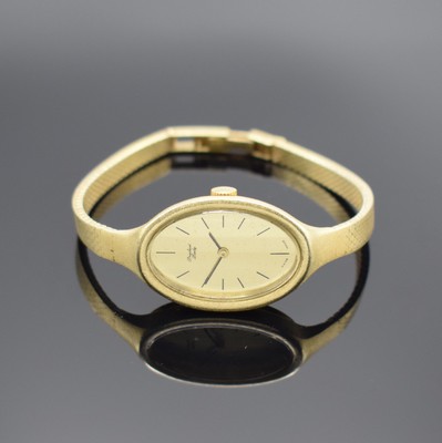PREDIAL Lady Damenarmbanduhr in GG 585/000, Schweiz um 1975, Handaufzug, 2-teil. Gehäuse, Boden aufgedr., Milanaiseband, gold. Zifferbl. fl., Kal. ...