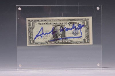 Andy Warhol, 1928-1987, 1 Dollar Bill 1935, mit schwarzem Filzstift handsigniert Rückseite mit Stempel Andy Warhol, mit Expertise Galerie 32 Nizza, ...