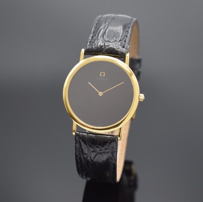OMEGA De Ville vergoldete Armbanduhr, Schweiz um 1990, quarz, Boden aufgedr., schwarzes Zifferbl. m. gold. Zeigern, D. ca. 32,5 mm, orig. Omega Etui ...