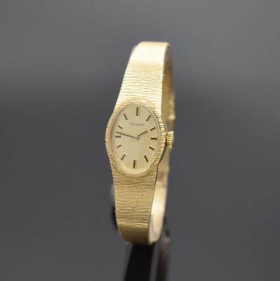 TASSO Damenarmbanduhr in GG 585/000, Schweiz um 1975, Handaufzug, Boden aufgedr., silb. Zifferbl. altersbed. pat., aufgel. Std.-Ind., gold. Zeiger, ...