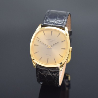 PATEK PHILIPPE Gübelin Herrenarmbanduhr in GG 750/000 Referenz 3544, Schweiz um 1960, Handaufzug, Boden aufgedr., gold. Zifferbl. m. aufges. ...