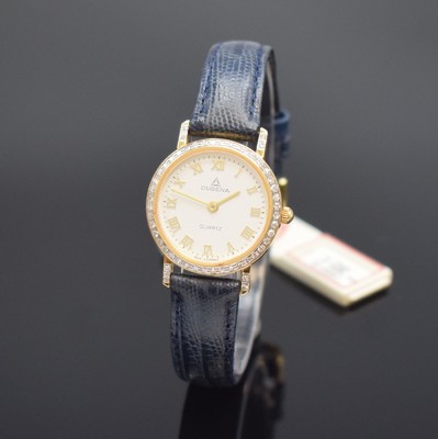 DUGENA Damenarmbanduhr in GG 585/000, Deutschland um 1995, quarz, 2-teil. Gehäuse, Boden aufgedr., Lünette u. Bandanstöße m. Diamanten bes., ...