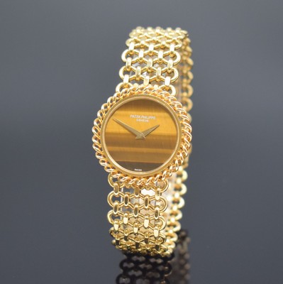 PATEK PHILIPPE Damengoldbanduhr Referenz 4283 mit Tigerauge-Zifferblatt, Schweiz um 1980, Handaufzug, gedr. Geh., Kordel-Lünette, anges. Kettenband ...