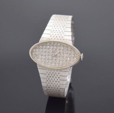 Ausgefallene Damenarmbanduhr in WG 750/000 mit aufwendigem Diamantbesatz, Schweiz um 1970, Handaufzug, gedr. Geh., Milanaiseband, WG-Zifferbl. m. ...