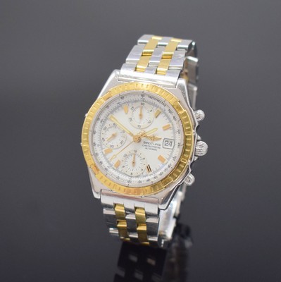 BREITLING Herrenchronograph in Stahl / Gold Referenz D13352, Schweiz um 2000, Automatik, verschr. Geh. m. orig. Pilotband, eins. drehb. gold. ...